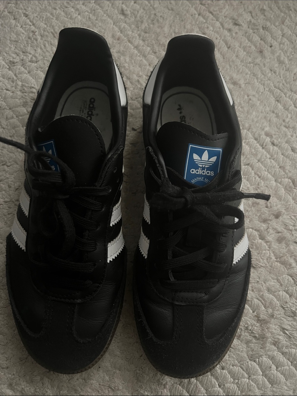 adidas Black Sneakers with White Stripes and Blue Logo Patch